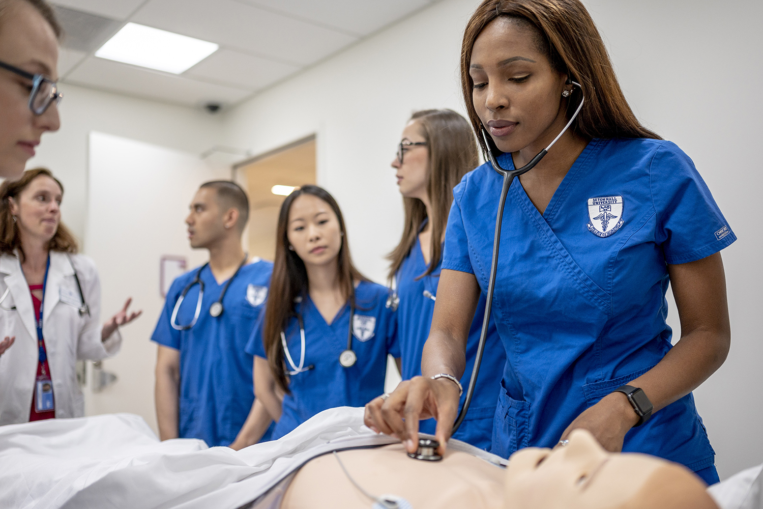 Student in a nursing simulation lab.