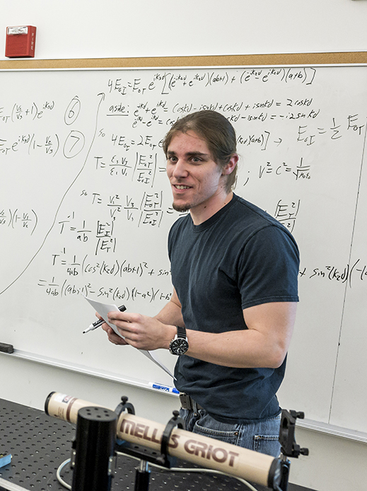 A professor teaching Physics