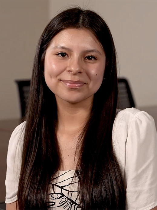 Student posing for the camera for a video shoot about the Nursing program.