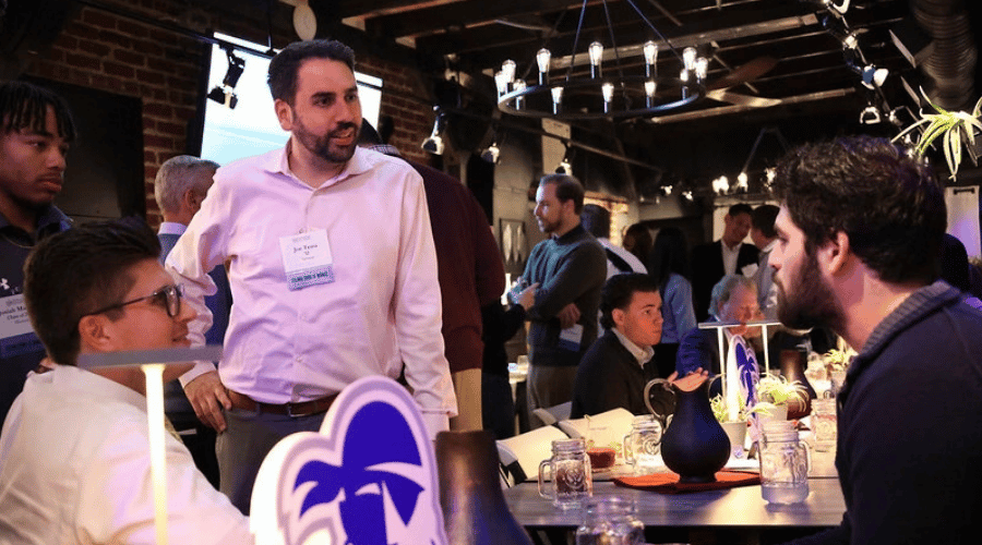 Mentors networking at restaurant 